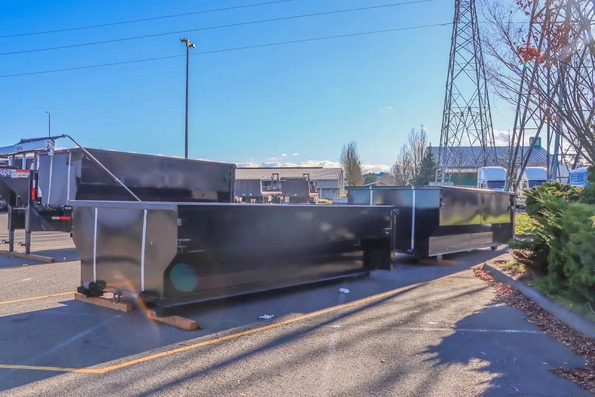 Roll-off dumpster ready for waste disposal at job site for Yard Waste Dumpster Rental in Petal